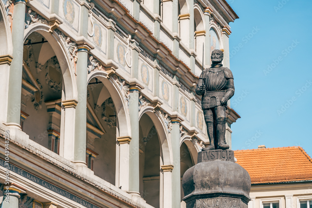 Historical Statue at Stary Rynek Square in Poznań, Poland, with a Beautiful Blue Sky