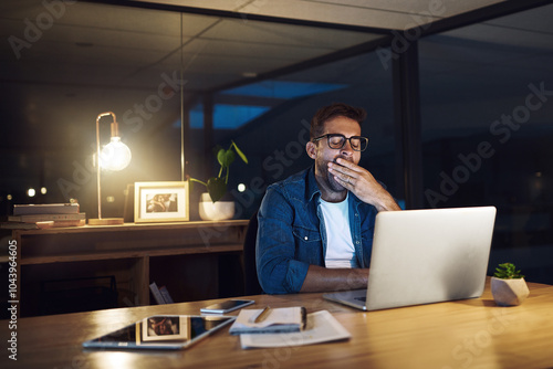 Yawn, night and tired businessman on laptop in office for research, online website and project deadline. Professional, worker and person on computer working late with burnout, fatigue and exhausted