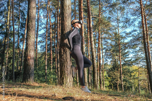 Workout. Fitness,VR outdoor workout in nature. Fitness, motivation for working the gym, health improvement. Woman doing sports outdoors,wellness, Health, nature, fitness, eco-fitness. mental health. photo