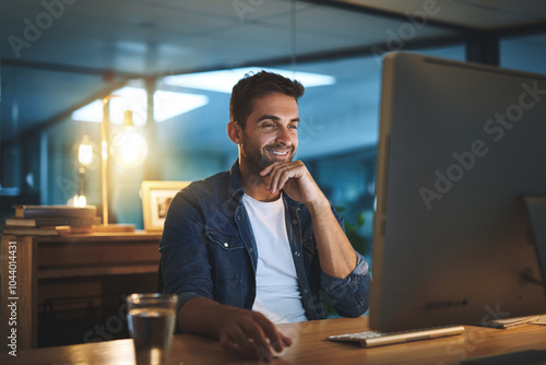 Computer, night and man in office with research for software development and data analytics of system. Reading, technology and male IT specialist working overtime with online firewall configuration.