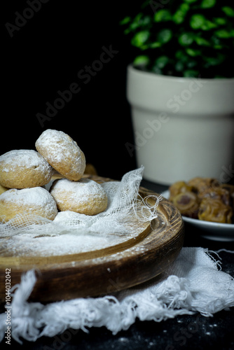 Sweets covered in powdered sugar photo