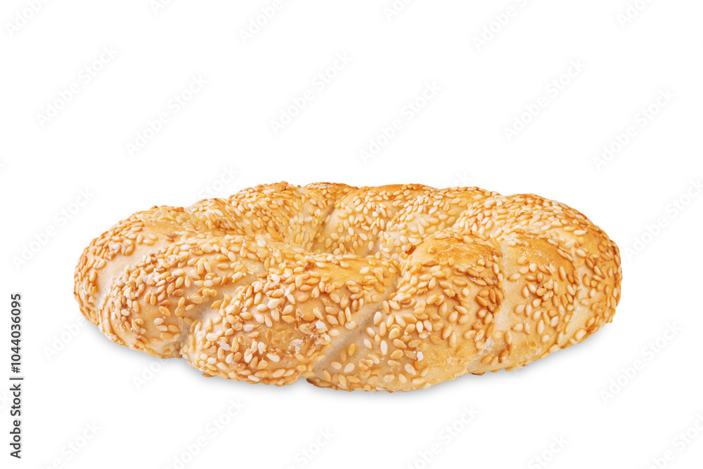 Sesame seeds topping round bagel on a white isolated nackground Sesame seeds topping round bagel on a white isolated nackground