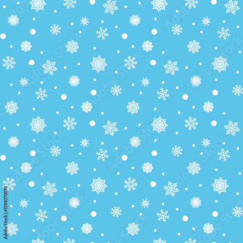 White snowflakes on a colored background of wrapping paper. Christmas holidays concept.