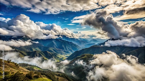 Scenic sunrise view of clouds over mountain range at Kuelap with shallow depth of field photo