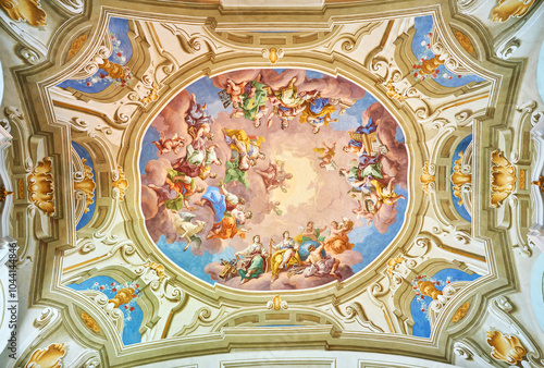 Admont library, Austria, 25 July 2024. A grand baroque library with a ceiling mural.