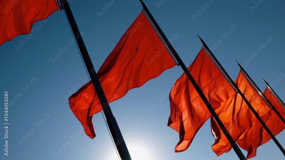 Red flags flutter in the breeze Red flags flutter in the breeze