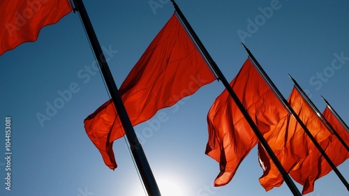 Red flags flutter in the breeze