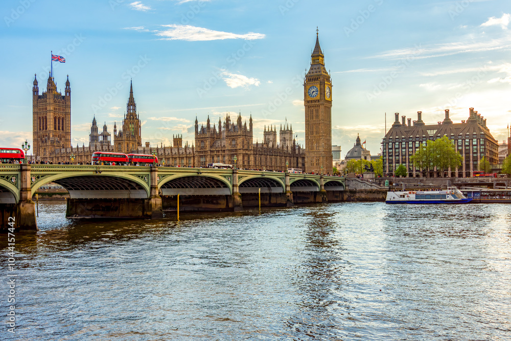 Houses of Parliament with Big Ben tower and Westminster bridge at sunset, London, UK Houses of Parliament with Big Ben tower and Westminster bridge at sunset, London, UK