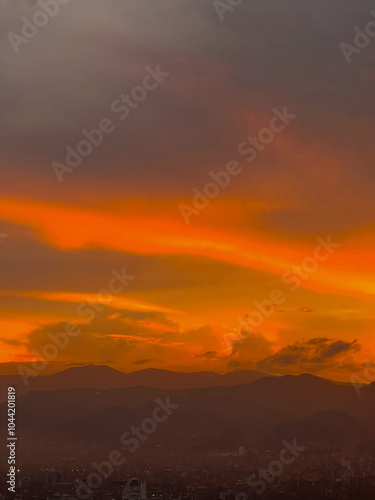 Beautiful orange sky background in the city. Medellin, Colombia. 