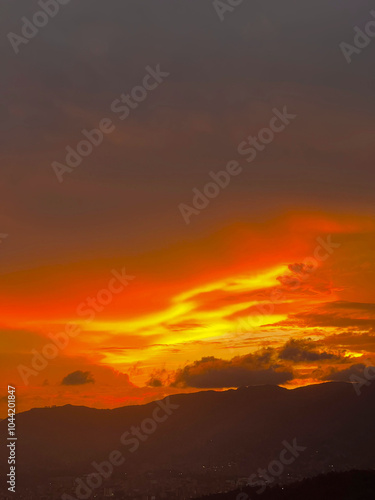 Beautiful orange sky background in the city. Medellin, Colombia. 