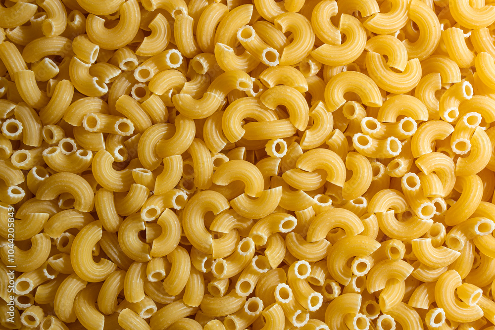 Uncooked Chifferi Rigati Pasta: A Culinary Canvas of Chifferi Rigati, Creating a Lively and Textured Background for Gourmet Cooking. Dry Pasta. Raw Macaroni - Top View, Flat Lay Uncooked Chifferi Rigati Pasta: A Culinary Canvas of Chifferi Rigati, Creating a Lively and Textured Background for Gourmet Cooking. Dry Pasta. Raw Macaroni - Top View, Flat Lay