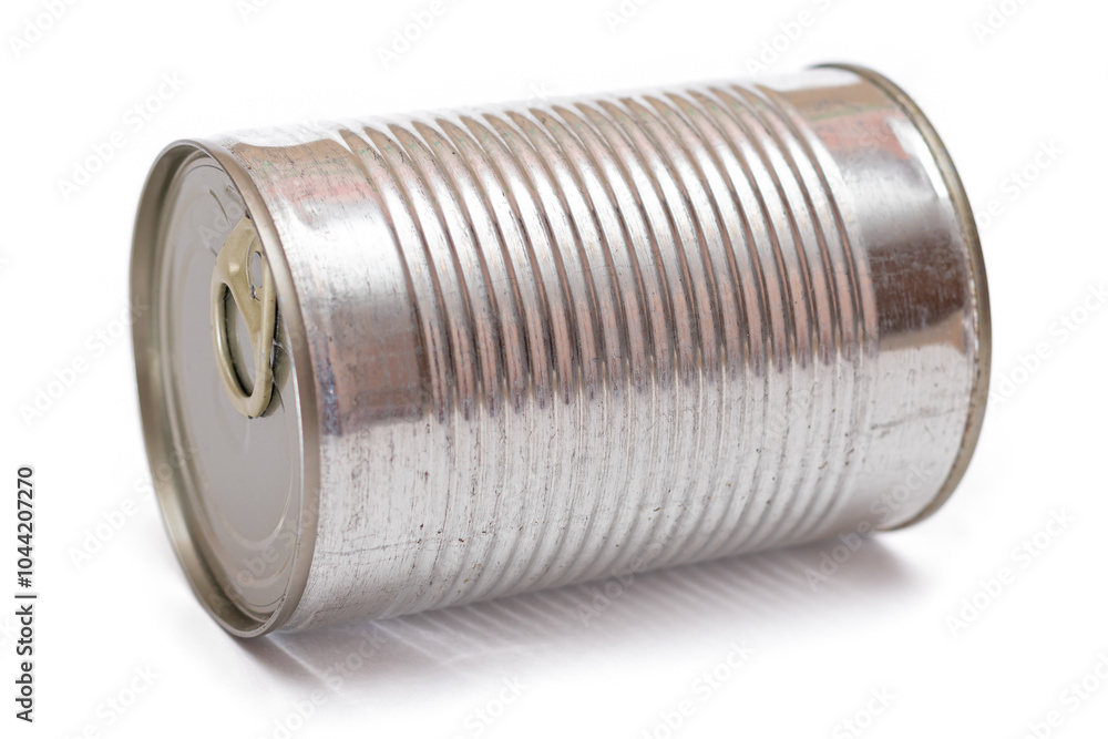 Round Unopened Tin Can Isolated on White Background. Canned Food. Aluminum Can for Safe and Long Term Storage of Food. Steel Sealed Food Storage Container - Isolation Round Unopened Tin Can Isolated on White Background. Canned Food. Aluminum Can for Safe and Long Term Storage of Food. Steel Sealed Food Storage Container - Isolation