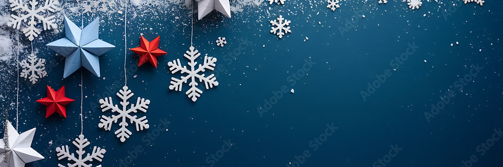 Fototapeta premium White snowflakes and red and blue stars on a dark blue background winter holiday design 