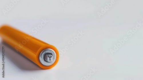 AAA Alkaline Battery on White Background - a practical and distinct visual. The AAA alkaline battery on a pure white backdrop creates a useful and recognizable scene photo