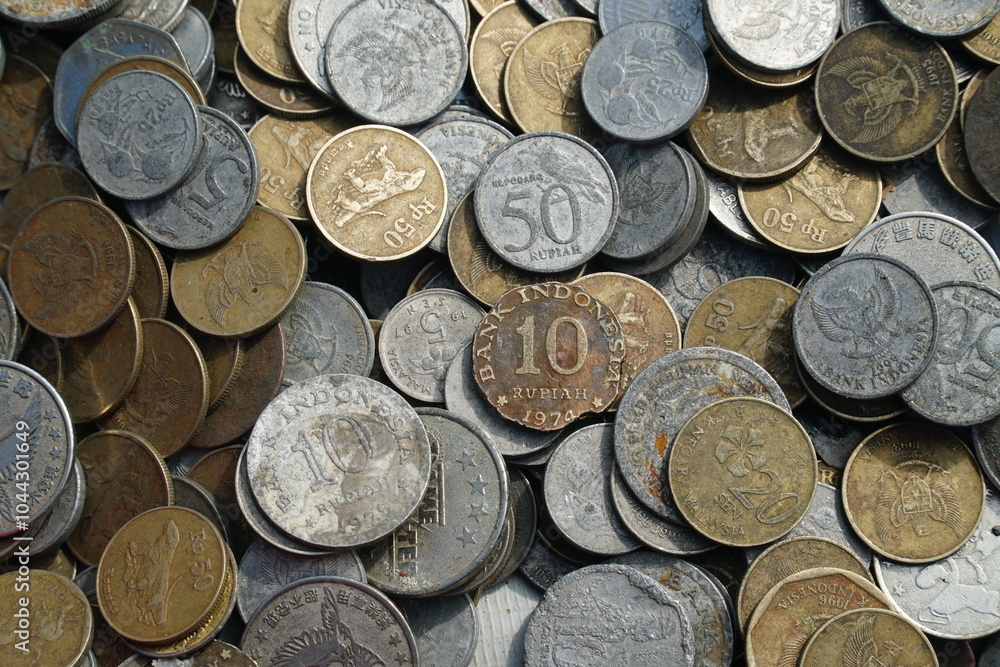 Stack of old Indonesian currency coins. No longer valid, only for collection Stack of old Indonesian currency coins. No longer valid, only for collection