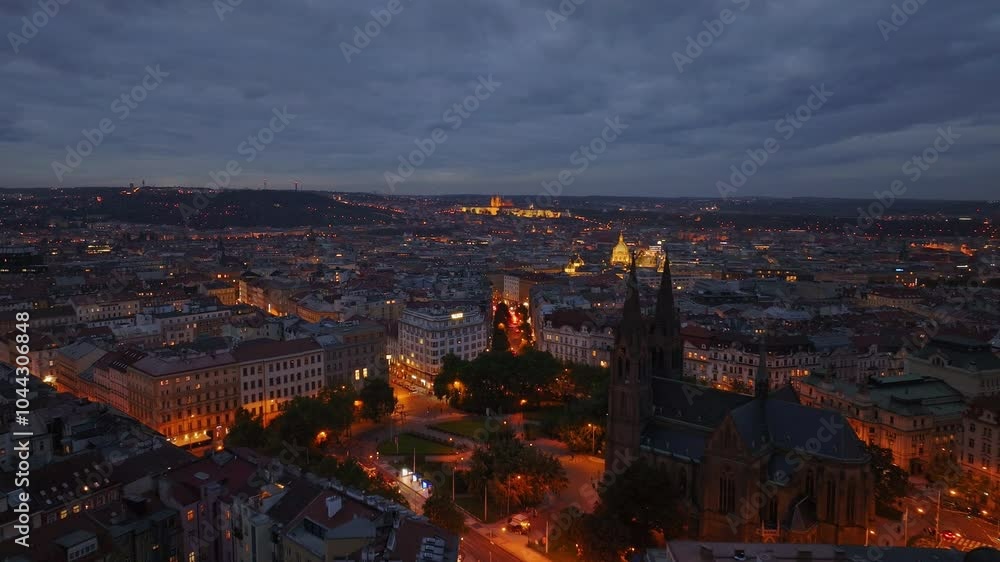 Dusk envelops Prague as city lights illuminate the skyline, showcasing the beauty of the Czech capital. The vibrant glow highlights iconic landmarks and charming streets Dusk envelops Prague as city lights illuminate the skyline, showcasing the beauty of the Czech capital. The vibrant glow highlights iconic landmarks and charming streets