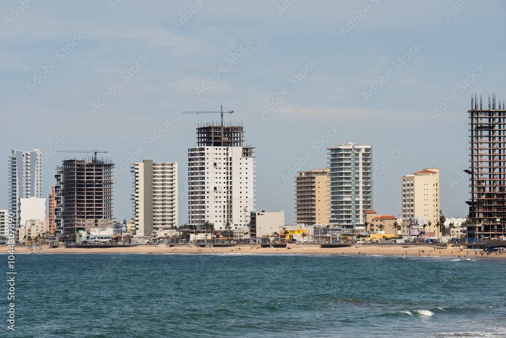 High rise buildings and construction along the beach in Mazatlan, Mexico High rise buildings and construction along the beach in Mazatlan, Mexico
