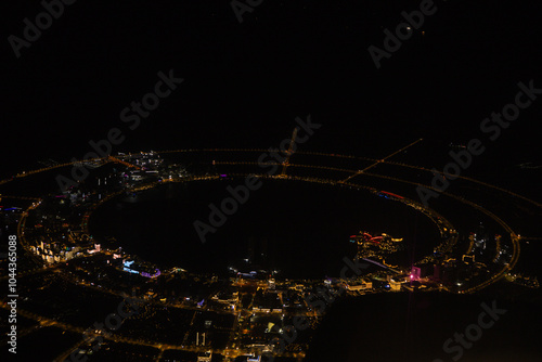 Shanghai - Aerial view of Dishui Lake and harbor at night photo