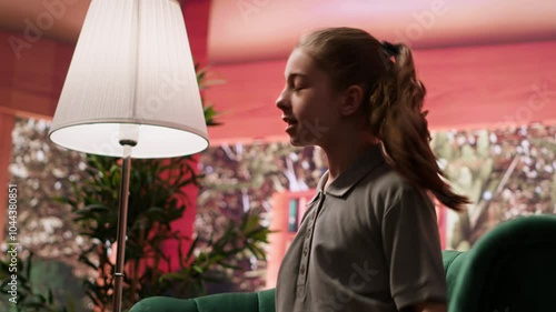 Young girl getting angry at psychologist when reviewing disturbing drawings, showing signs of murder deviant behavior. Teenager with social problems and anger management issues. Camera A.