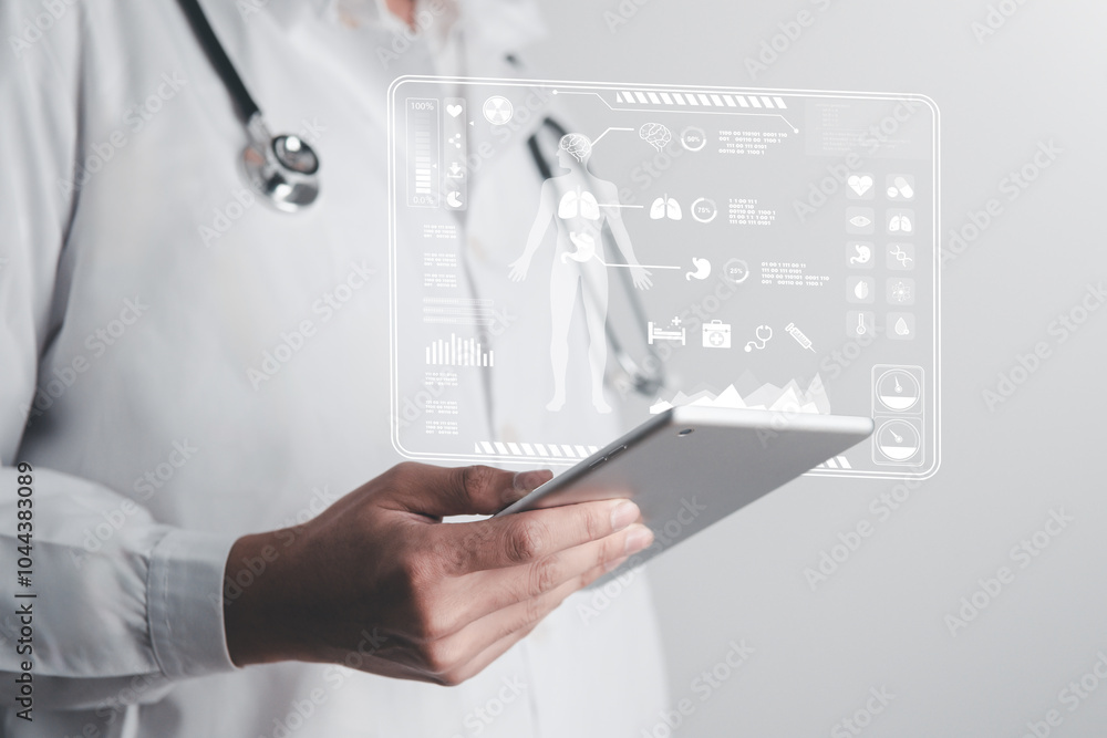 Doctor standing and using tablet with digital screen for data analysis and medical research in hospital Doctor standing and using tablet with digital screen for data analysis and medical research in hospital