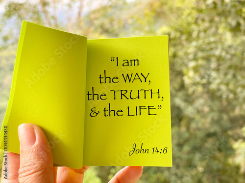 I am the way, the truth and the life -John 14:6, biblical verse on paper with nature background. 