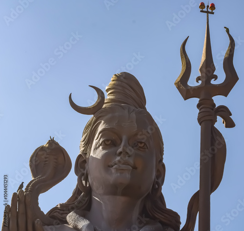 Big statue of Lord Shiv near Delhi International airport, Delhi, India, Lord Shiv big statue touching sky at main highway Mahipalpur, Delhi photo