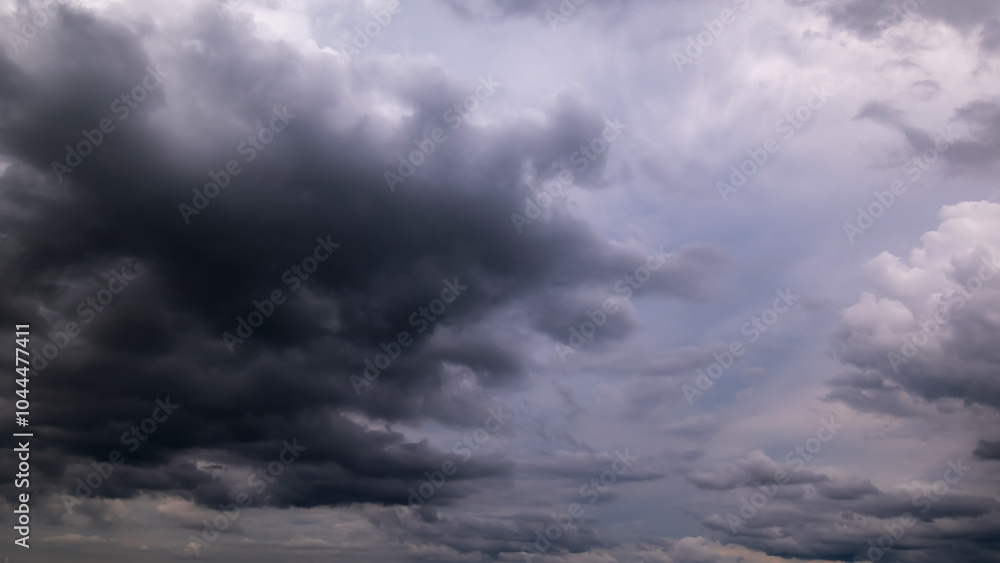 dark storm clouds with background,Dark clouds before a thunder-storm. dark storm clouds with background,Dark clouds before a thunder-storm.