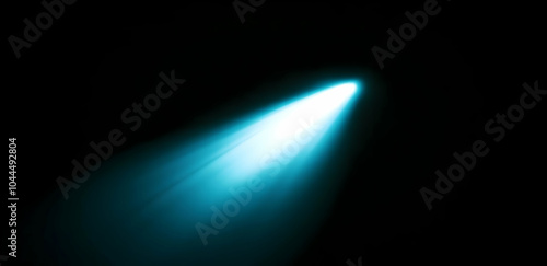 Blue Light Beam Shining on Black Background photo