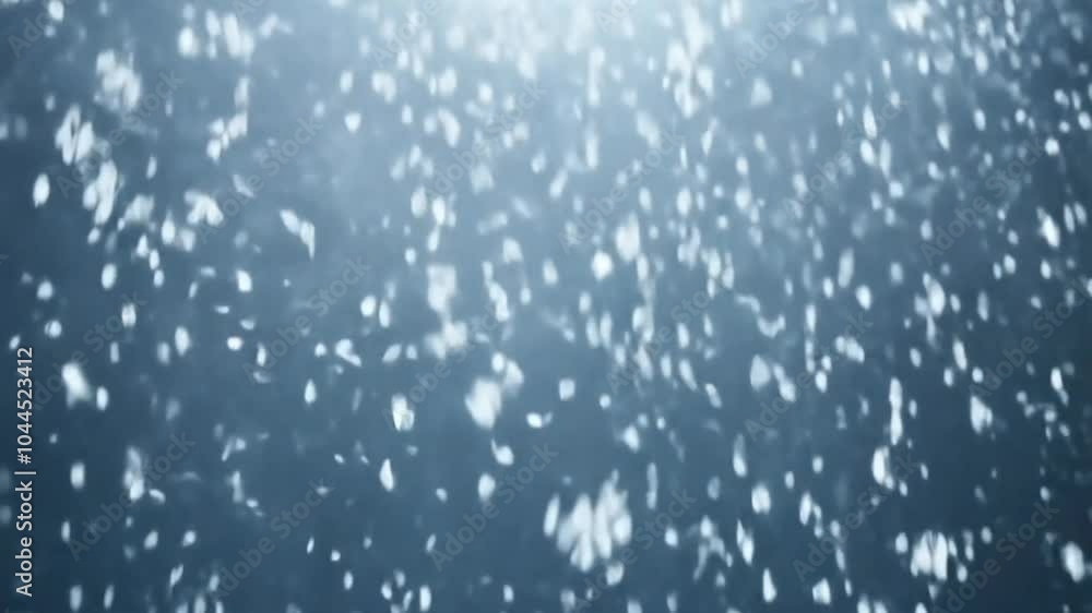 An underwater scene with floating particles resembling bubbles or snowflakes. An underwater scene with floating particles resembling bubbles or snowflakes.
