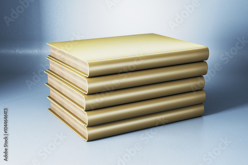 Creative row of stacked golden books on gray backdrop. Library  knowledge and education concept.