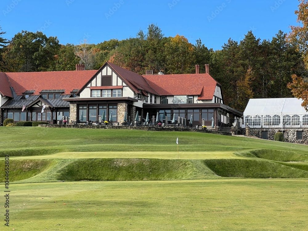 Golf course and clubhouse in autumn Golf course and clubhouse in autumn