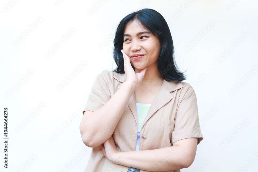 happy calm asian woman smiling confident wearing casual brown clothes isolated on white background happy calm asian woman smiling confident wearing casual brown clothes isolated on white background
