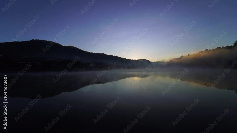 foggy with sunrise over the river foggy with sunrise over the river