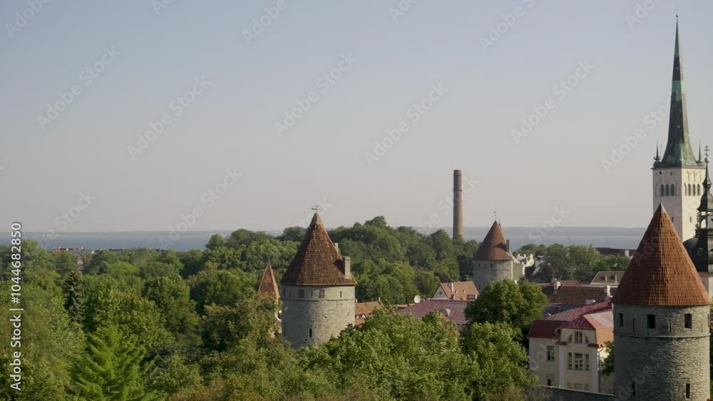 Slow motion pan across skyline of Tallinn, Estonia with St. Olaf Church Slow motion pan across skyline of Tallinn, Estonia with St. Olaf Church
