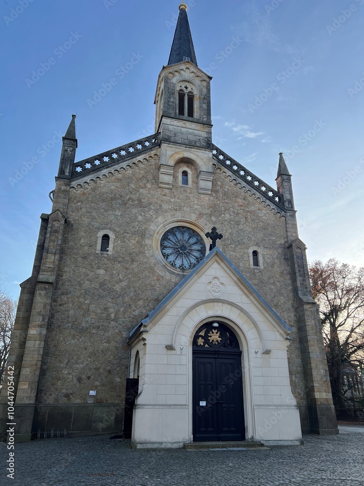 Naklejka premium The Holy Cross Church in Görlitz is a beautiful example of Gothic architecture, known for its historical significance and stunning details in the heart of the city.