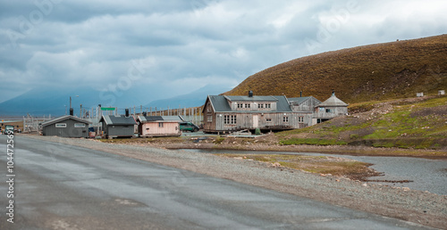 Exploring the historic architecture of Longyearbyen in Svalbard under cloudy skies