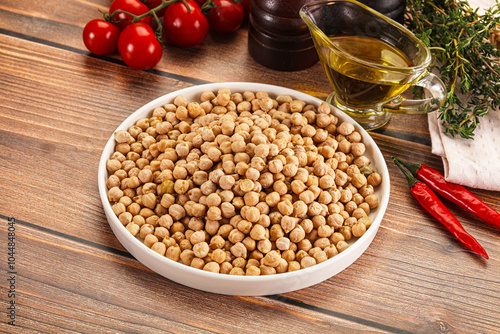 Dry chickpea seeds heap in the bowl