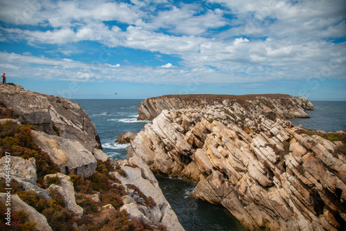 cliffs of moher at the coast, rock slices like bread, Peniche Portugal photo