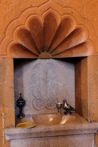 Slika na platnu Ornate stone alcove with carved cross and decor.