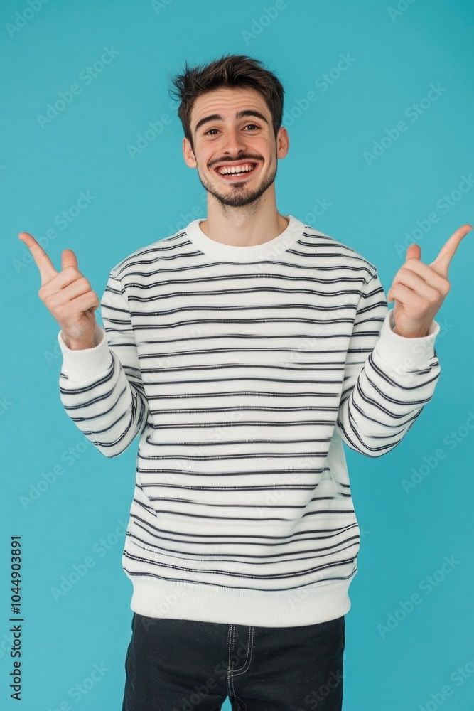 A person wearing a white and black striped shirt A person wearing a white and black striped shirt