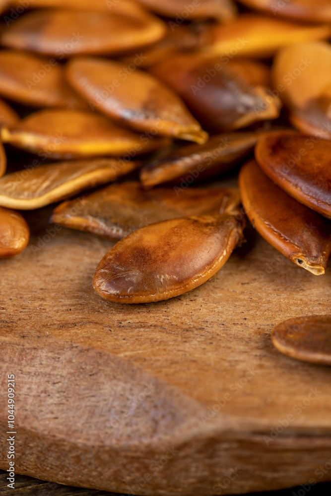 overcooked or burnt pumpkin seeds on the table overcooked or burnt pumpkin seeds on the table