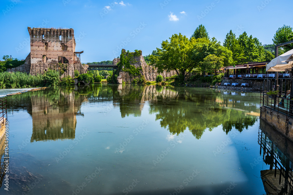 Summer on the Mincio river. Historic village of Borghetto sul Mincio Summer on the Mincio river. Historic village of Borghetto sul Mincio