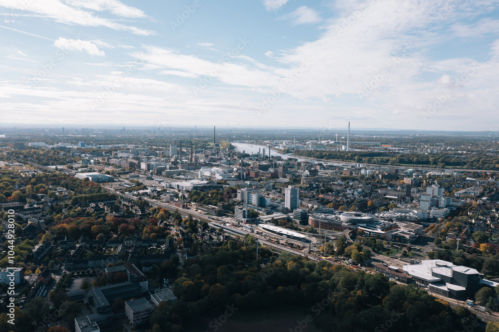 Aerial autumn cityscape panorama of Leverkusen city, North Rhine-Westphalia, Germany and industrial area surroundigs