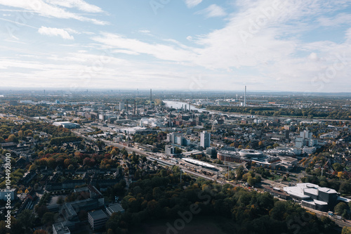 Obraz na płótnie Aerial autumn cityscape panorama of Leverkusen city, North Rhine-Westphalia, Germany and industrial area surroundigs w salonie