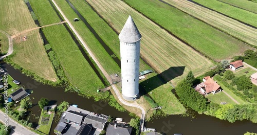 Aerial footage of the water tower in De Meije village on a sunny day in Nieuwkoop, The Netherlands. photo