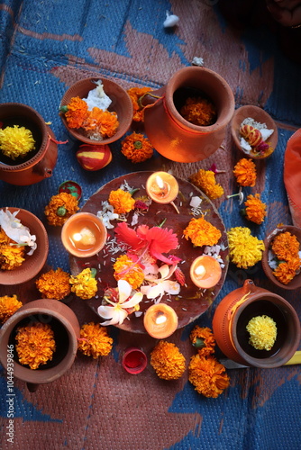 Traditional Karwa Chauth rituals, featuring Karwa Sthapana, diya lighting, and Chhat Pooja elements, symbolizing devotion, culture, and celebration of love and prosperity in Indian festivals photo