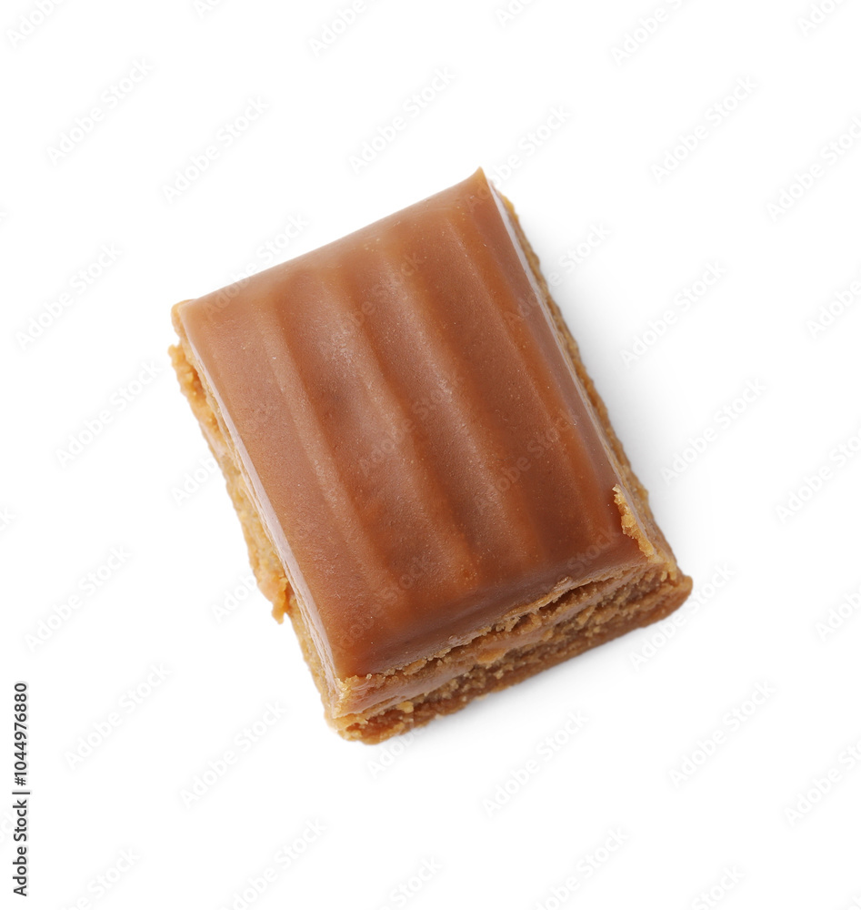 Tasty sweet caramel candy isolated on white, top view Tasty sweet caramel candy isolated on white, top view