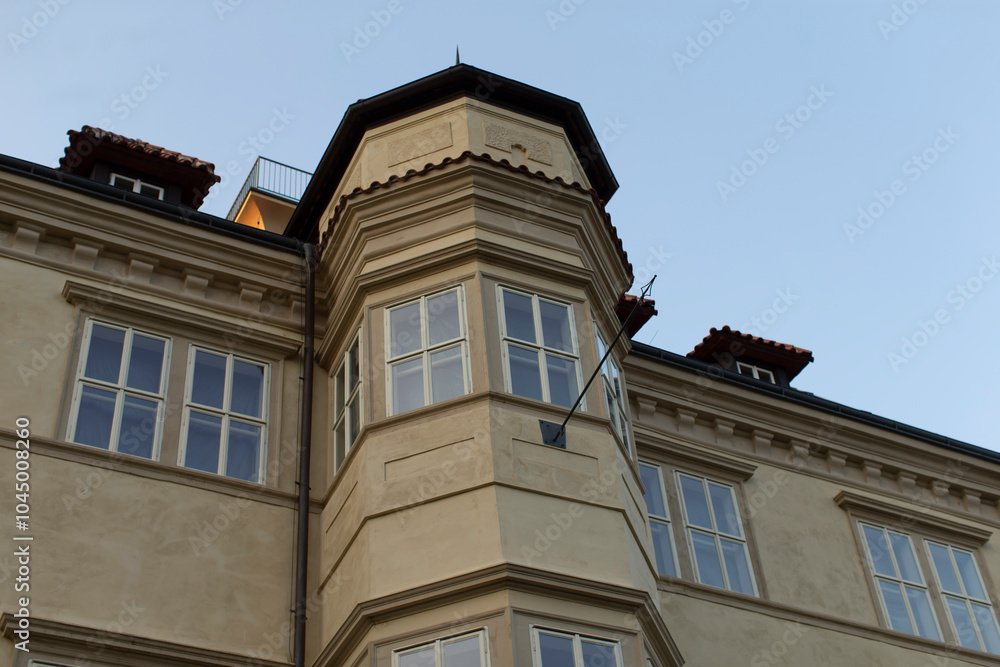 A large and impressive building that features a prominent tower situated on its top, offering stunning views of the surrounding area A large and impressive building that features a prominent tower situated on its top, offering stunning views of the surrounding area