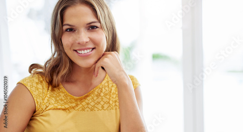 Happy woman  portrait or smile in apartment to chill for comfort in living room for satisfaction. Casual  peace or proud female person in house on resting break for confidence or wellness in Spain