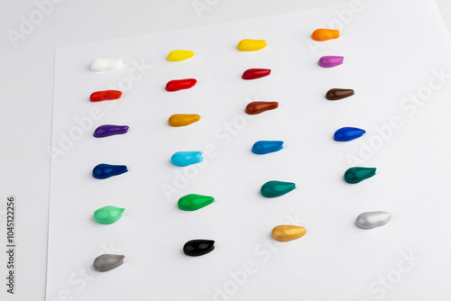 Paint blobs of different colors isolated on white, set
